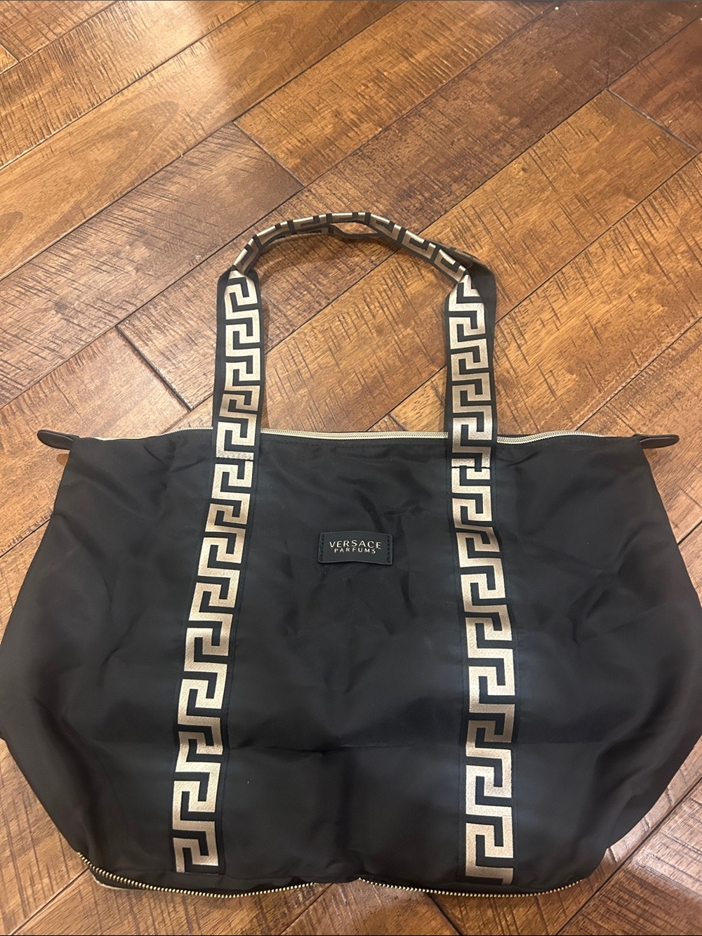 Versace Parfume Black Tote with Gold Greek Key Straps and Can Wrap up into Bag.